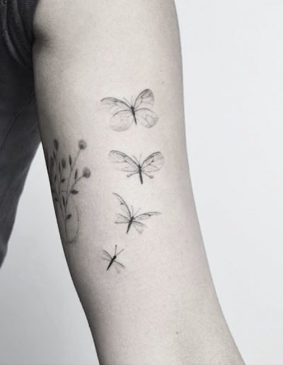 gergo augusztiny hungary budapest minimal fineline butterfly tattoo